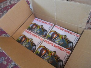 Billionaire Buddha is flying through the mail to readers everywhere!